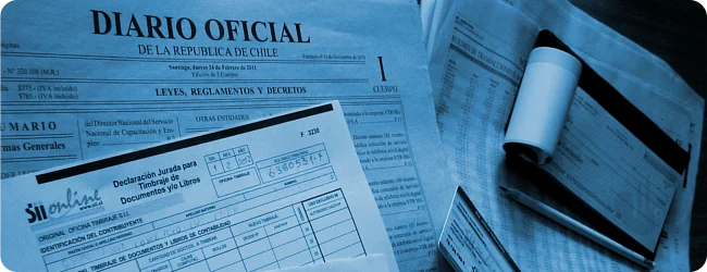 Diario Oficial de la República de Chile junto a formularios del Servicio de Impuestos Internos